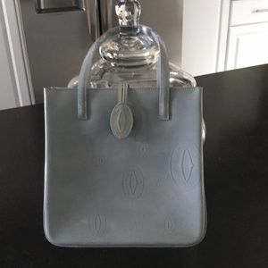 Patent leather Cartier handbag